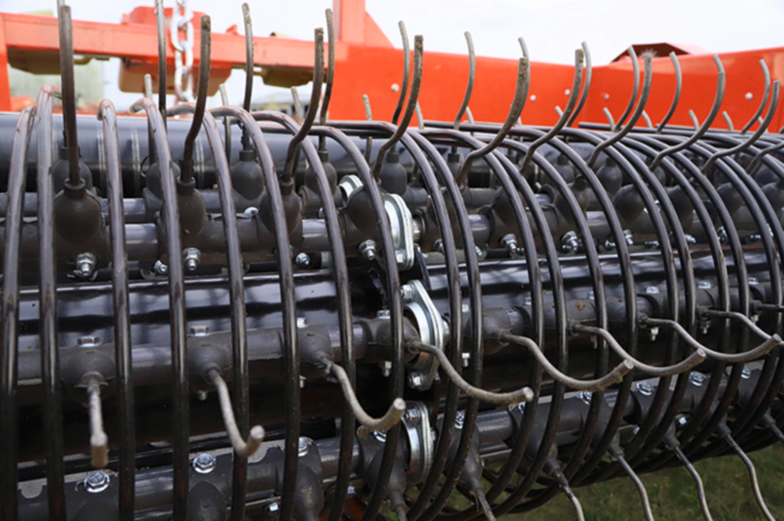 Tractor pulling custom bean harvesting equipment in wide rows