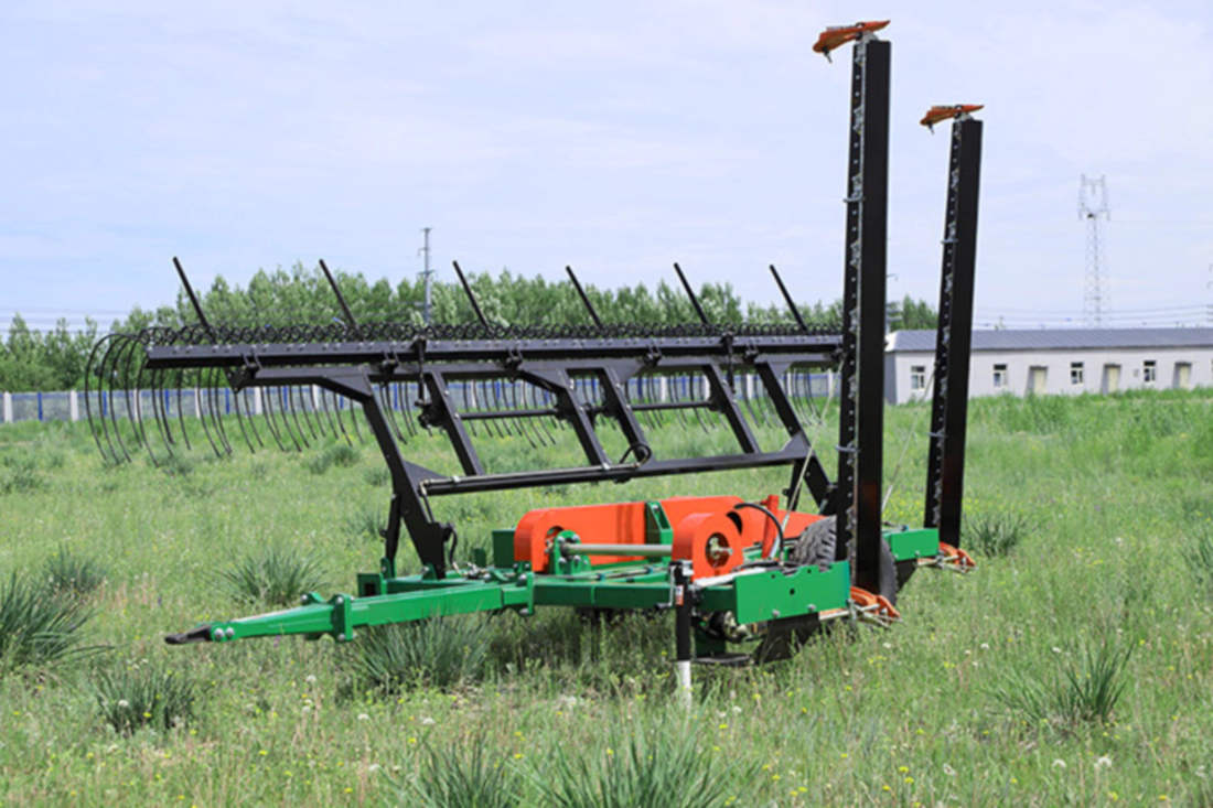 Close up view of the heavy duty trailing rake mechanism