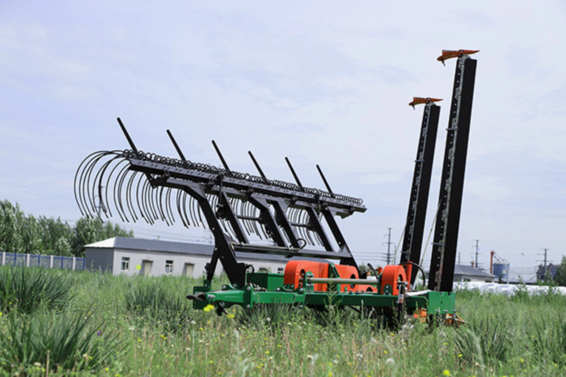 Heavy duty cutting blades of the tractor pulled lawn mower underneath deck
