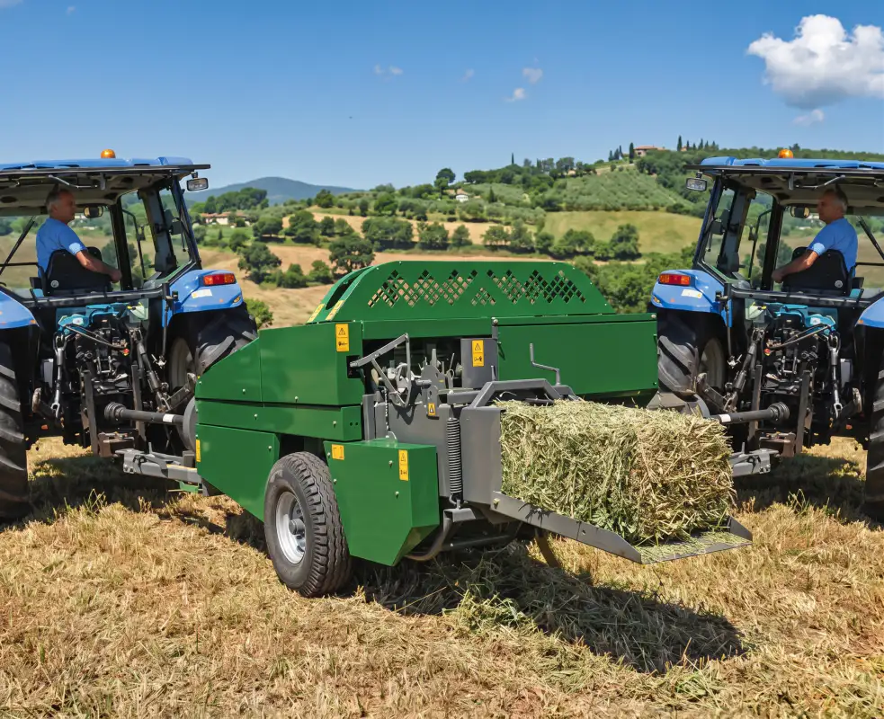 Square baler working in a field producing high density bales